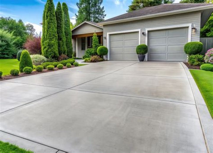 How thick is a residential concrete driveway?